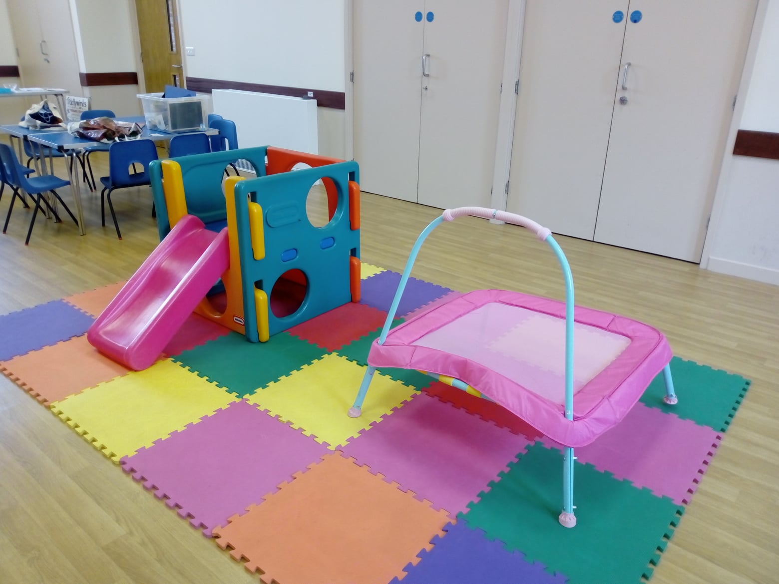 Trampoline and slide at Tiddlywinks